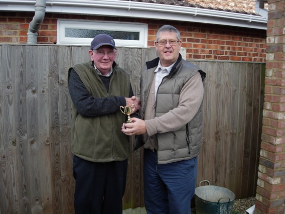 The Section Secretary presenting Ray Faux with the Photo Cup.